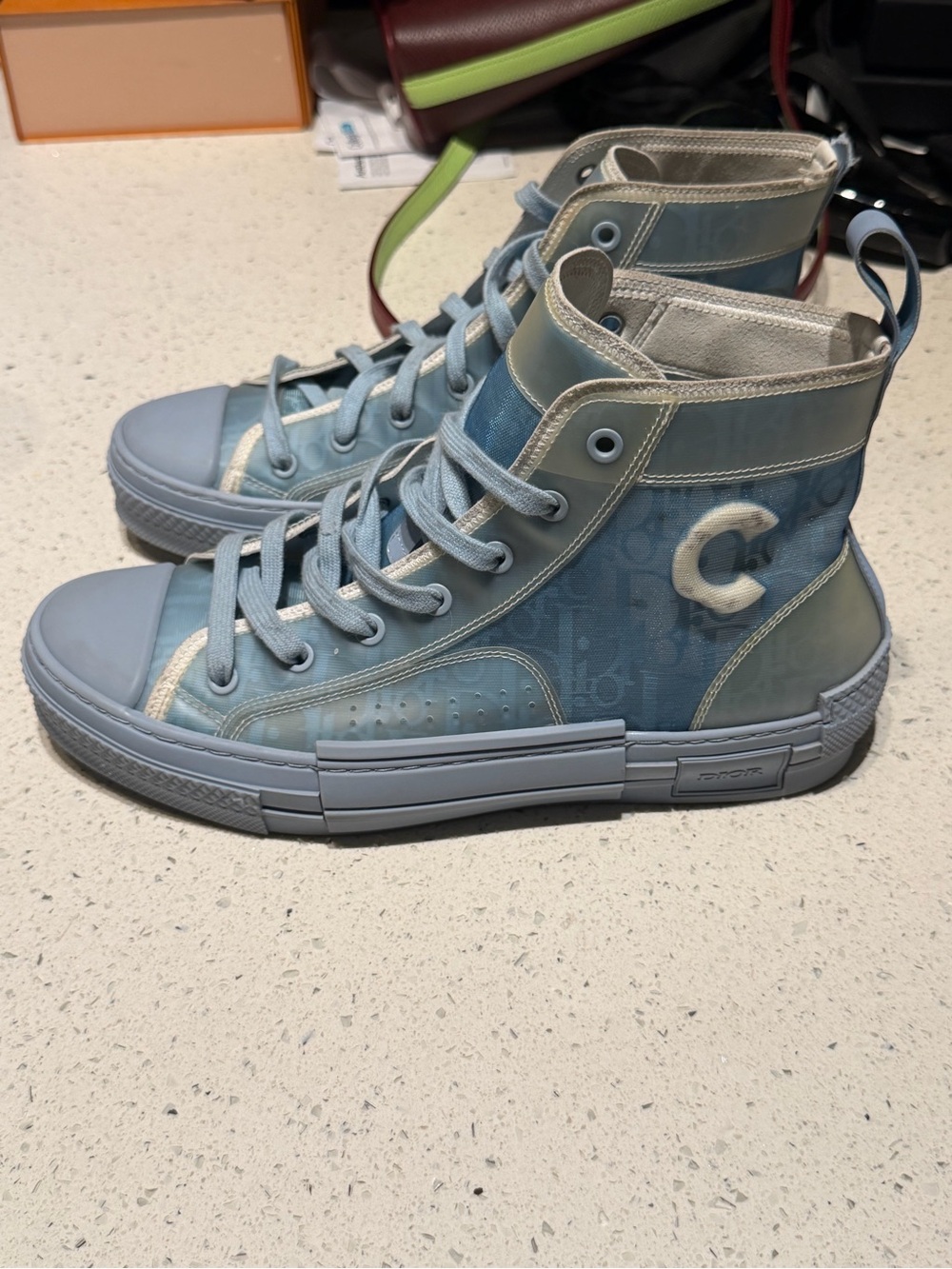 Dior b23 Light Blue High-Top Sneakers damaged